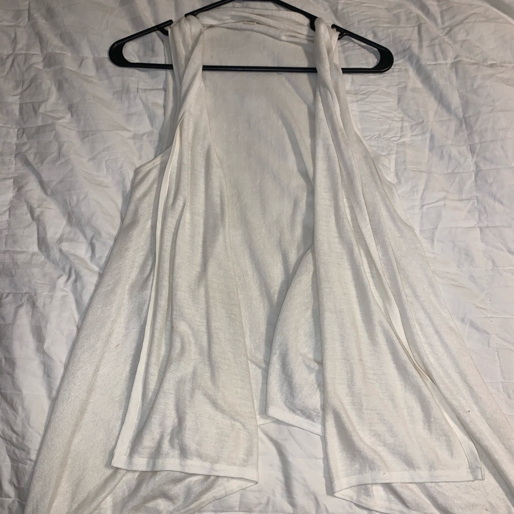 Cream sleeveless cardigan